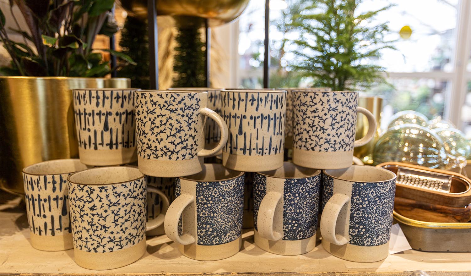 Blue and white mugs with intricate designs